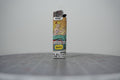 Hand-collaged lighter made from Disney comic book paper, showing a mermaid with cut-paper text "feminism and beauty"