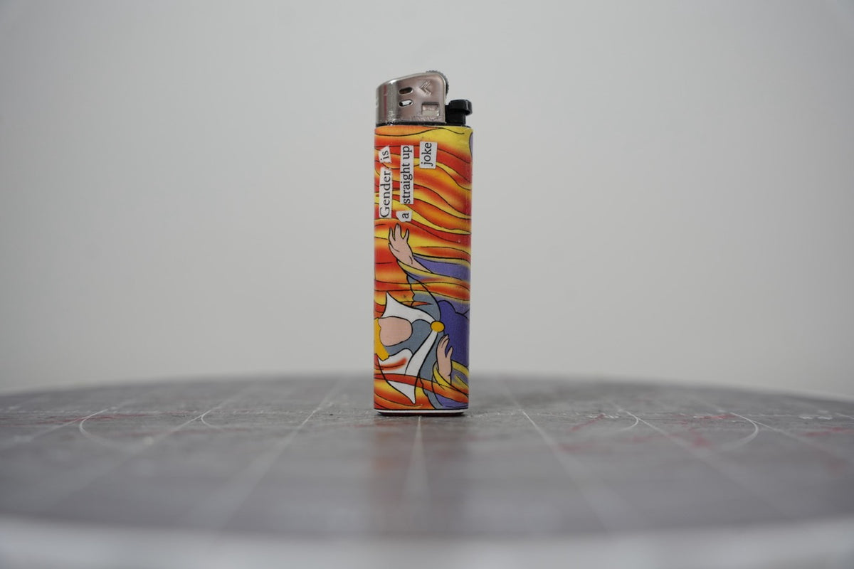 Reverse side of the Disney comic collage lighter showing red and yellow flame artwork