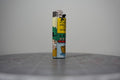 Handmade collage lighter covered in vintage Disney comic book paper, two dwarves rowing a yellow boat