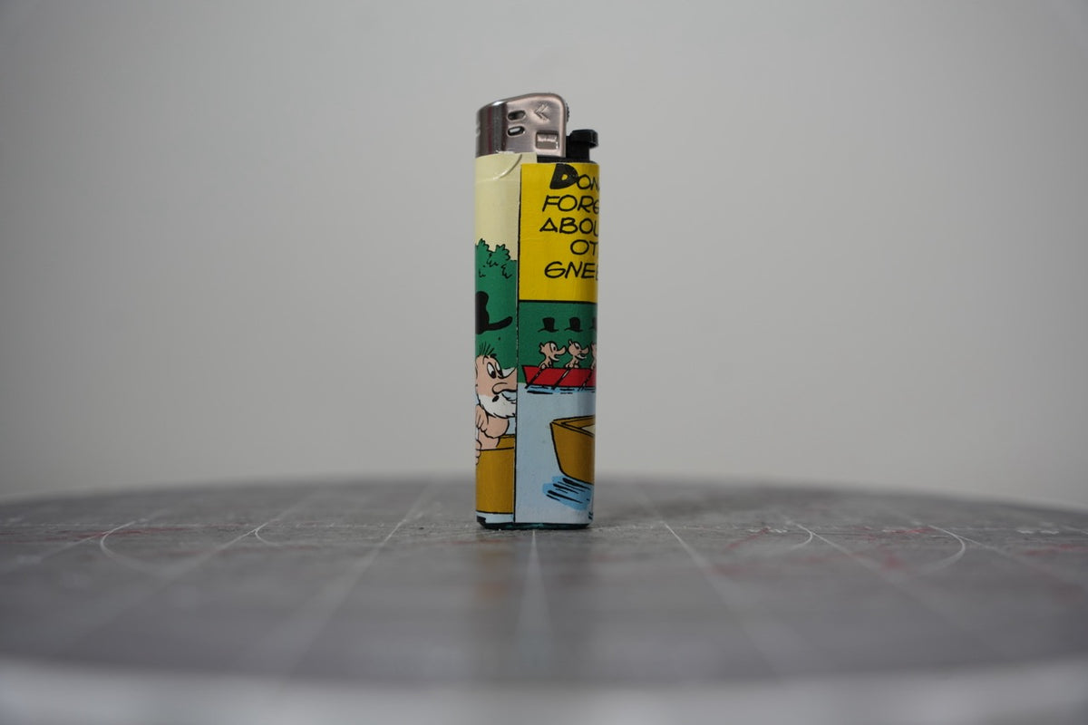 Handmade collage lighter covered in vintage Disney comic book paper, two dwarves rowing a yellow boat