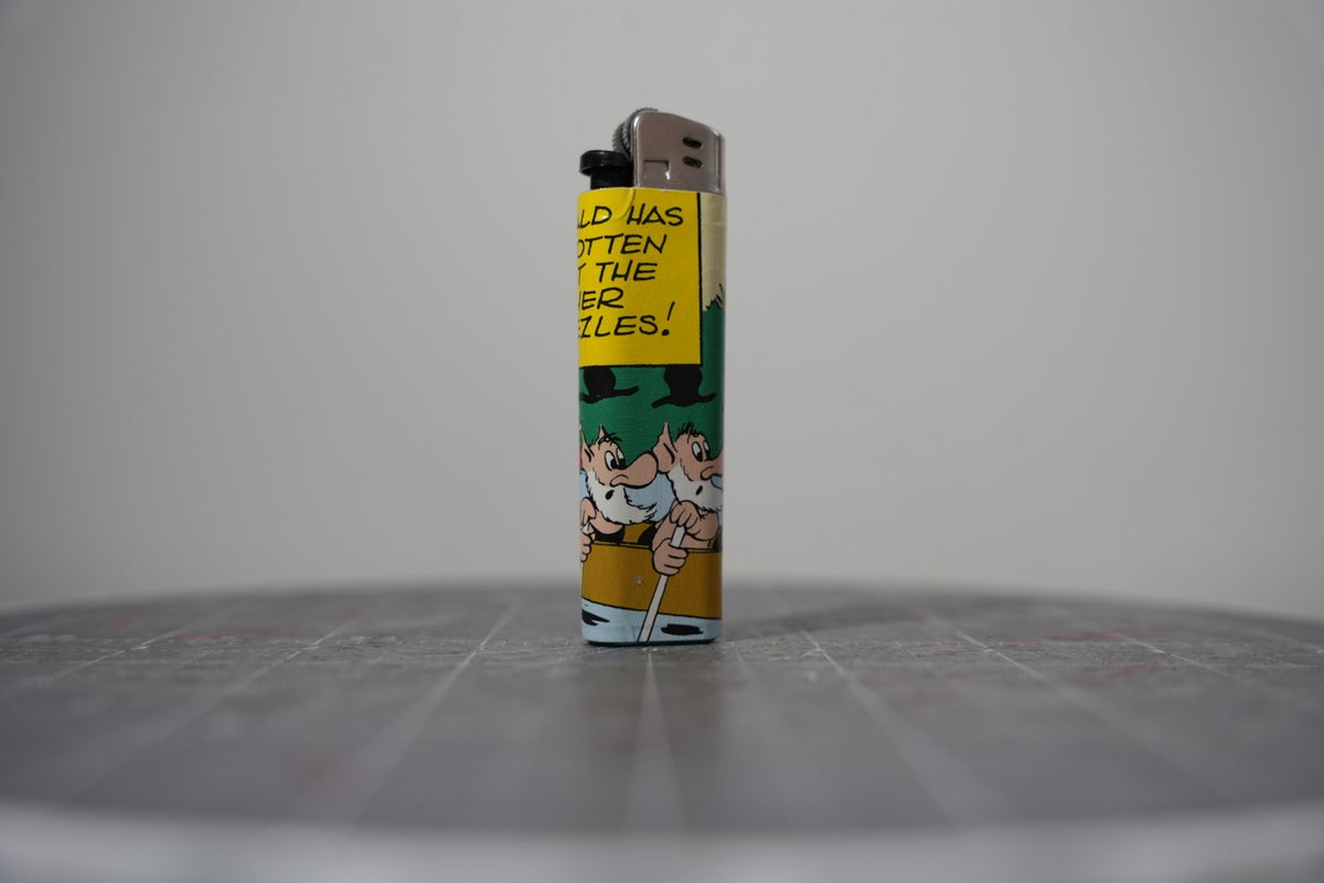 Reverse side of the same Disney comic book collage lighter