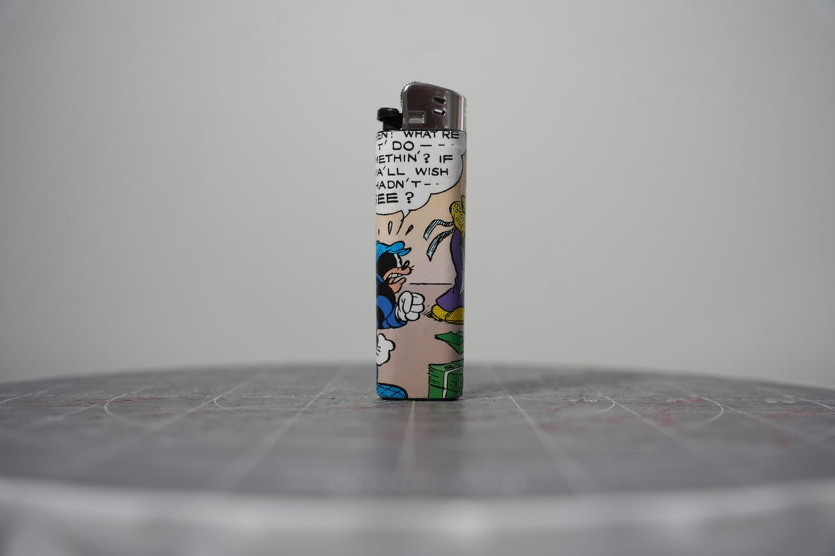 Reverse of the Disney comic book collage lighter showing a cloaked figure