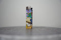 Handmade collage lighter made from vintage Disney comic book paper, crowd scene with a cannon firing