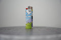 Handmade collage lighter made from vintage Disney comic book paper, the Evil Queen holding a yellow lightning bolt