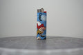Handmade collage lighter made from vintage Disney comic book paper, Grumpy chopping at a giant cobweb