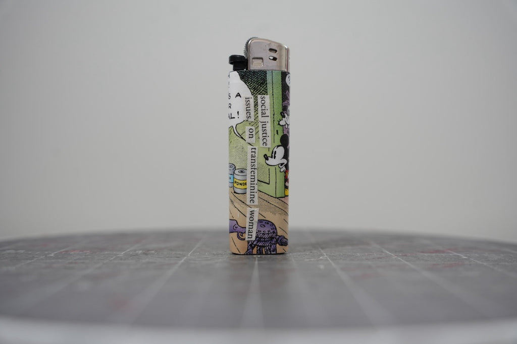 Reverse side of the same Disney comic book collage lighter
