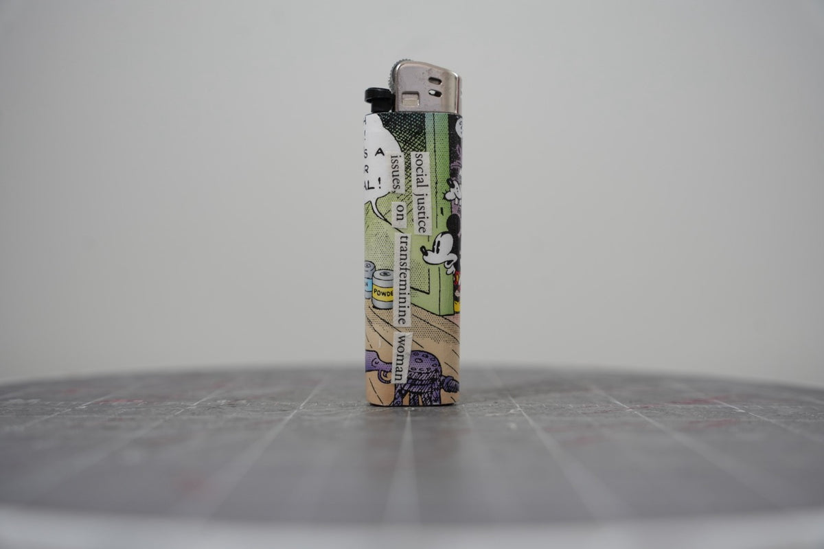 Reverse side of the same Disney comic book collage lighter