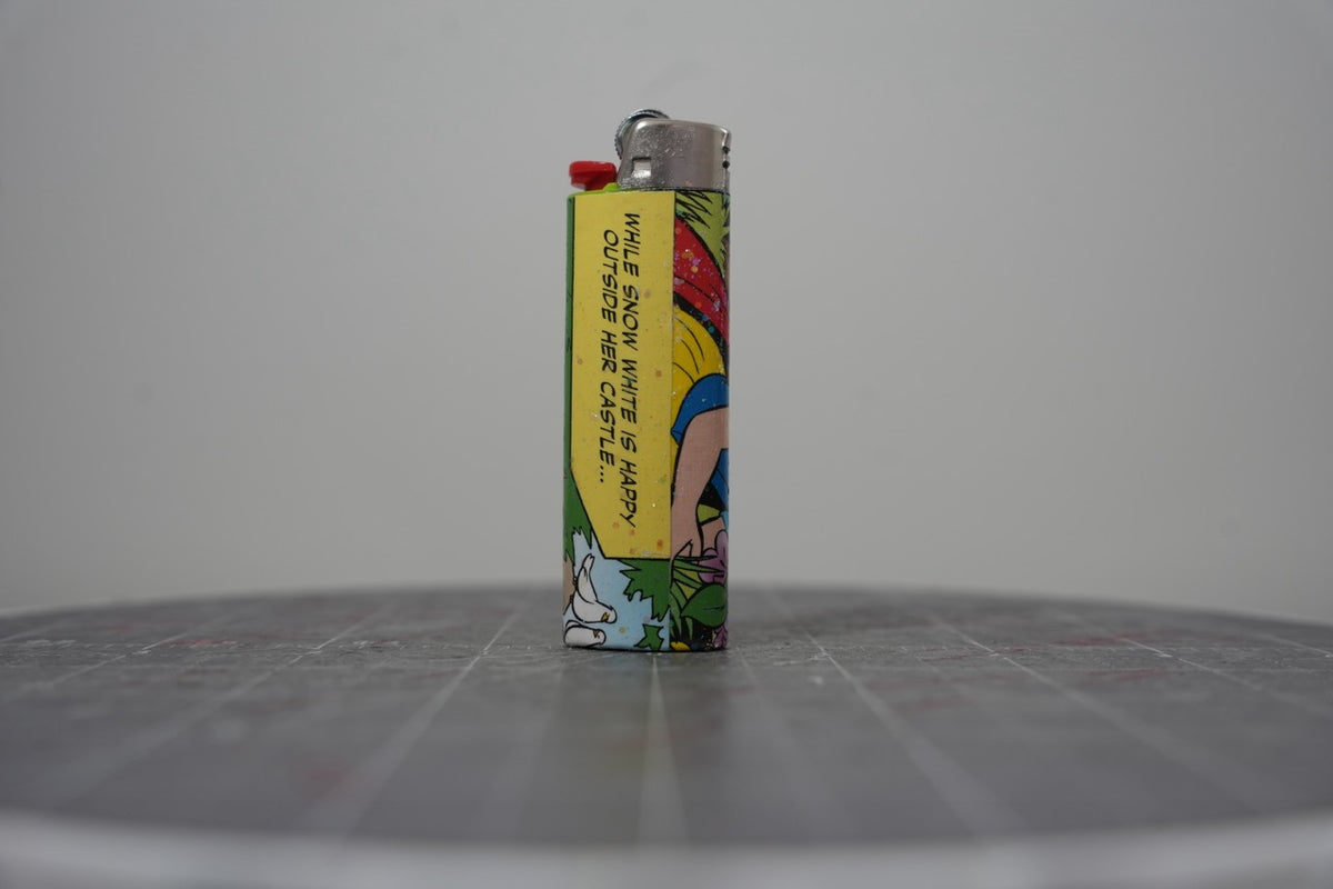 Reverse side of the same Disney comic book collage lighter