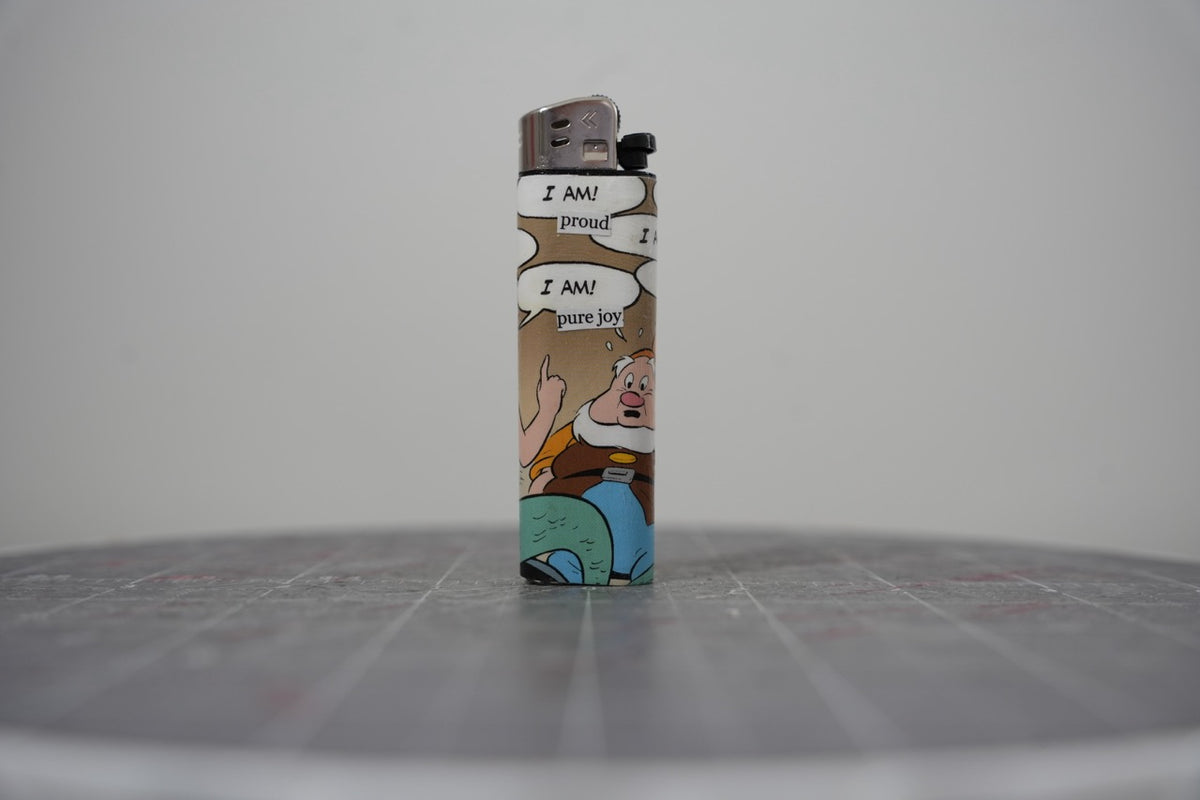 Reverse side of the same Disney comic book collage lighter