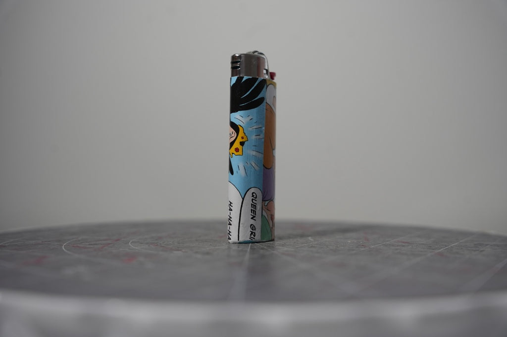 Disney comic book collage lighter, detail of the ha-ha-ha speech balloon