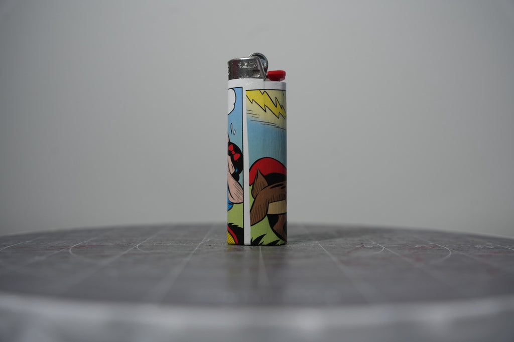 Reverse of the Disney comic book collage lighter showing a yellow lightning bolt