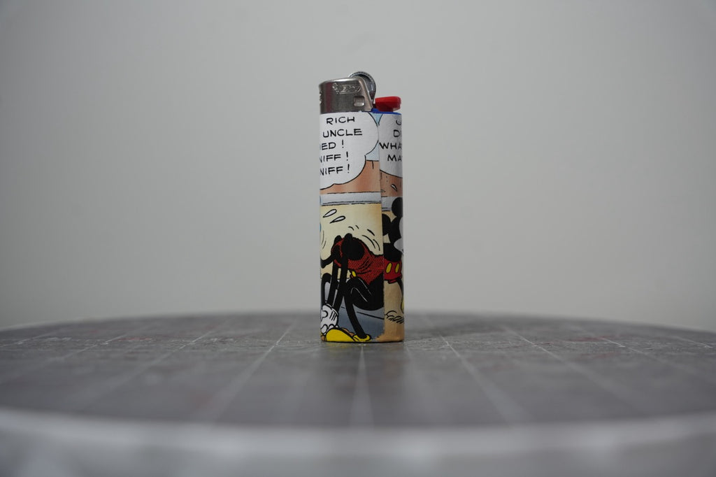 Handmade collage lighter made from vintage Disney comic book paper, Goofy sobbing next to Mickey