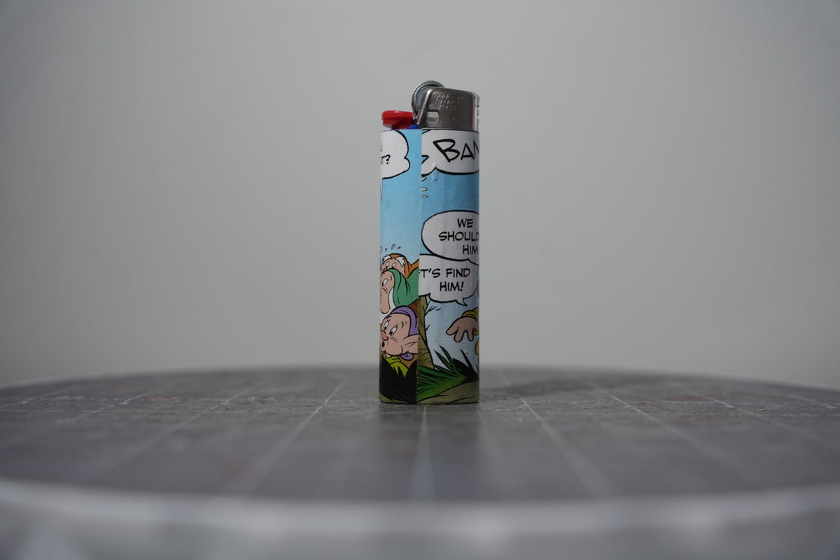 Reverse of the Disney comic book collage lighter showing a big BANG and let's find him