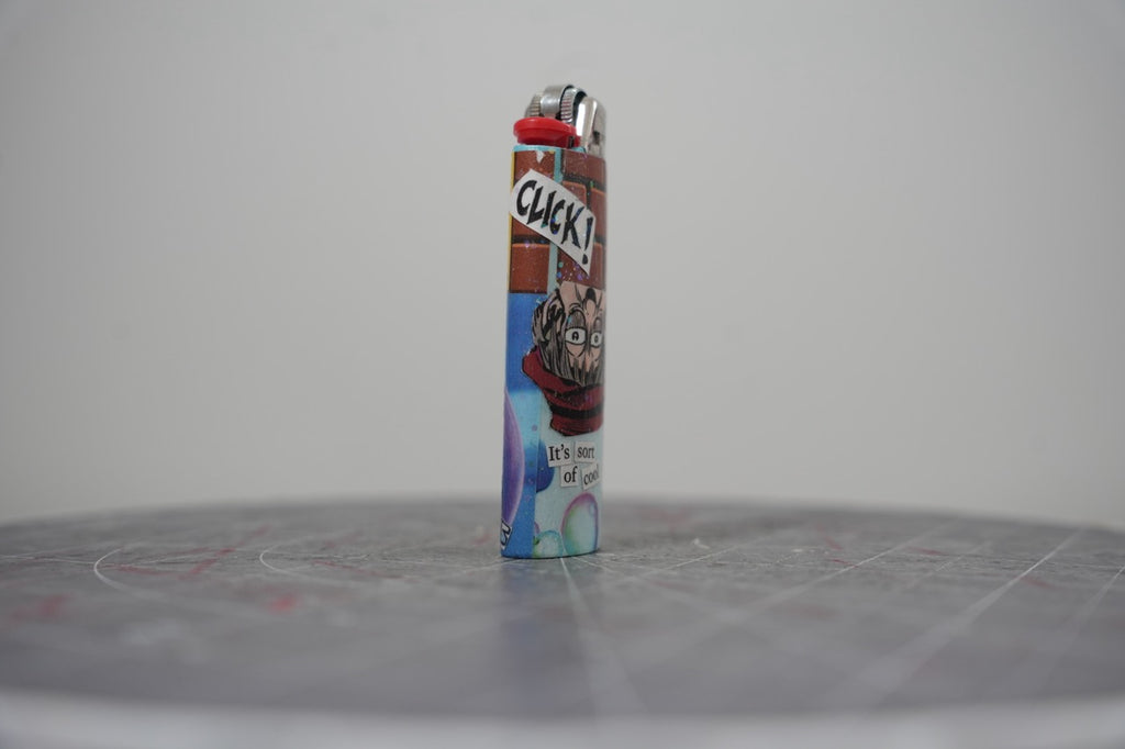 Second view of the collage lighter showing the CLICK! lettering