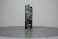Handmade collage lighter with temples, a big open cartoon mouth and the words feel inspiration while having fun