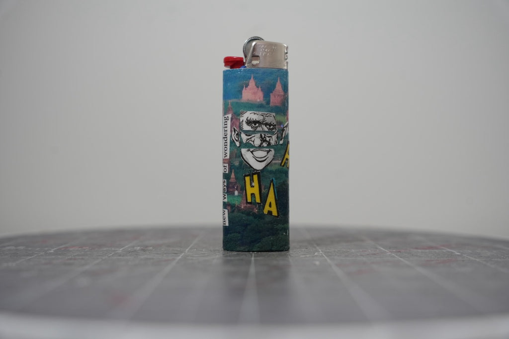 Fifth view of the collage lighter showing a laughing man's face