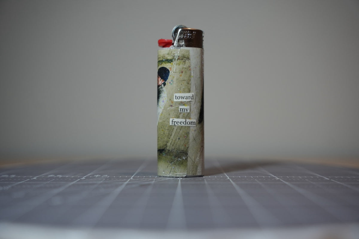 Handmade collage lighter, pale cream and sage with the words toward my freedom